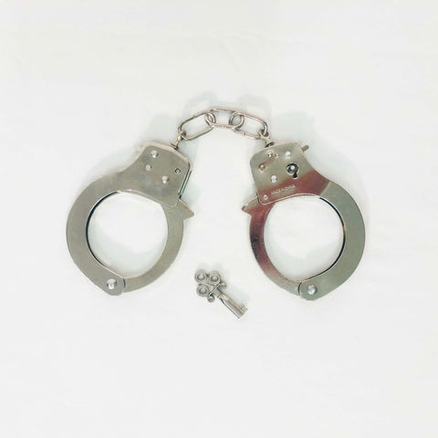 Handcuffs with Quick Release Button